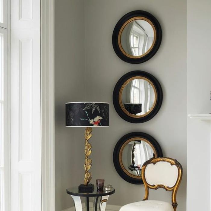 raganos veidrodžio apibrėžimas 3 su juodos ir auksinės spalvos rėmeliais