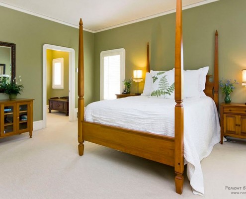 Camera da letto con pareti olivastre