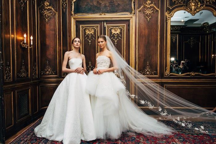 beyaz haute couture gelinlik, prenses modeli ve pileli etek ve tüylü üst ile orijinal model