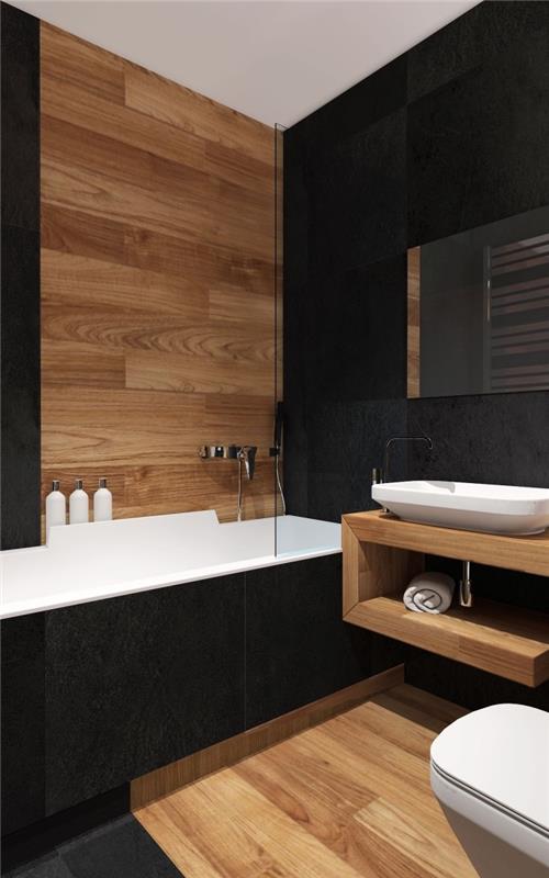juodos ir medinės vonios pavyzdys su baltais akcentais, moderni vonios plytelių idėja tamsiame atspalvyje