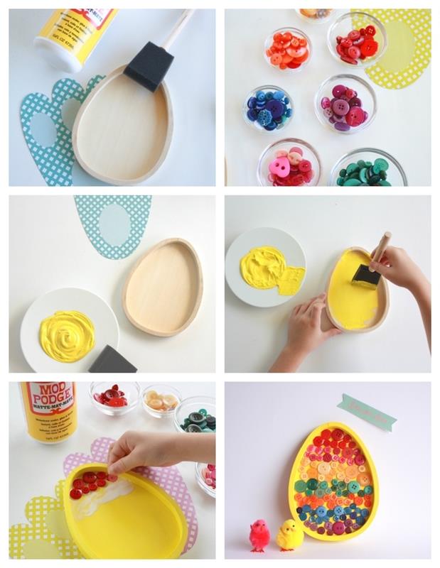 pirminės rankinės veiklos Velykų tema pavyzdys su medine kiaušinio formos plokštele, perdažyta geltonais dažais ir priklijuotų spalvotų sagų puošmena