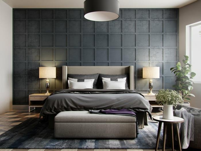 pilka sienų plokštė, pakabinama augalų lempa, du abažūriai, pilkas miegamojo dekoras