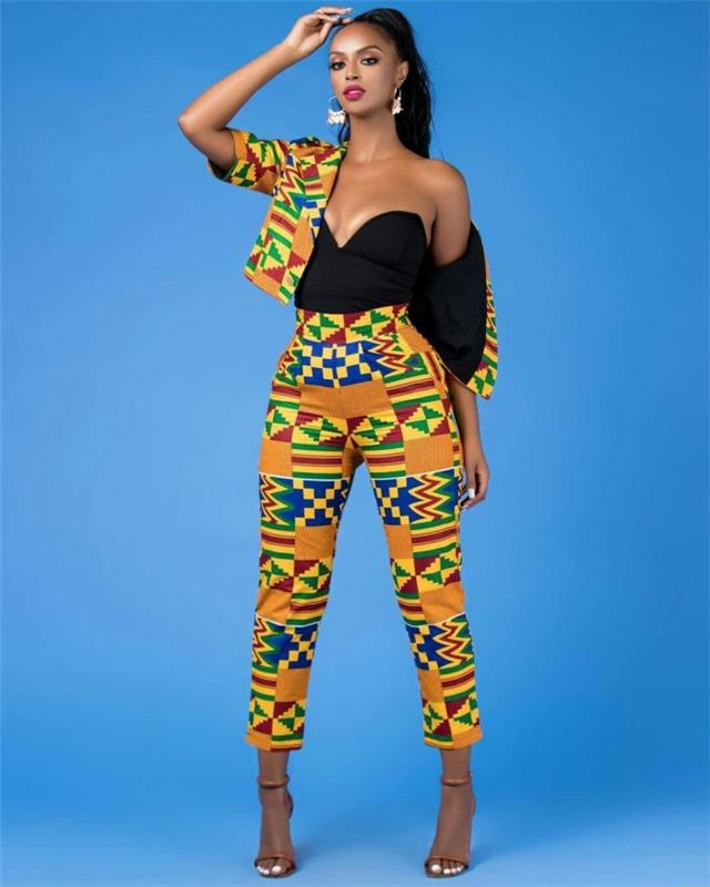 kako se lepo obleči ženska, dvodelne hlače v afriškem slogu in jopič iz voščene zanke v kombinaciji s črnim vrhom
