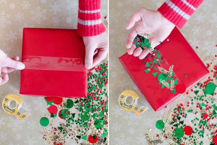 zamisel, kako preprosto narediti darilni paket, rdeča škatla, okrašena z lepilnim trakom z rdečim in zelenim bleščicami