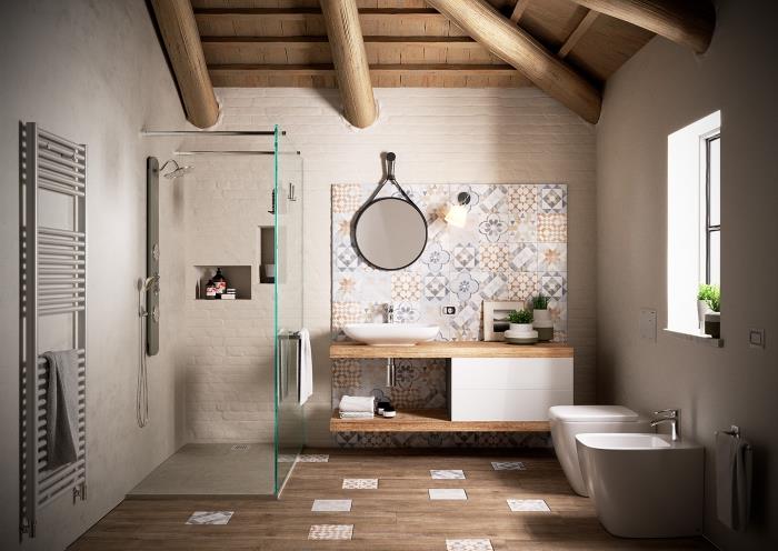 „Zen“ vonios kambarys, įrengtas neutraliais tonais ir natūraliomis medžiagomis, su cemento plytelių efektu