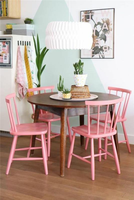 prenoviti kuhinjo, kuhinjo prebarvati s pastelno modrimi in belimi stenami, štirje stoli, pobarvani v rožnato sladkarije, okrogla miza v rjavi barvi