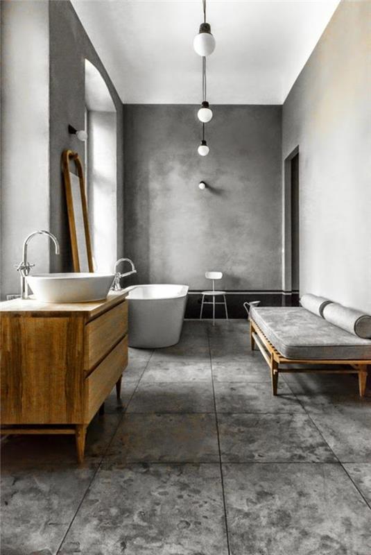 inci gri renk geniş banyo beyaz küvet ve lavabo hafif ahşap lavabo dolabı
