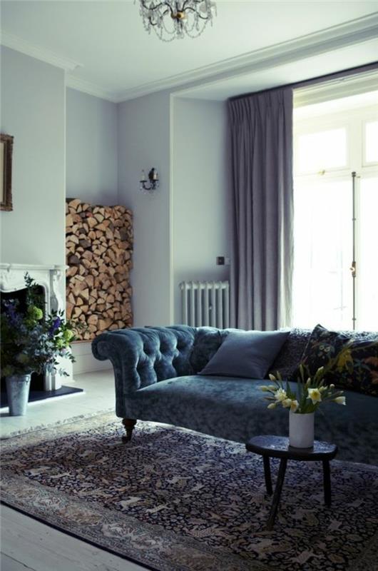 paint-wall-living-room-match-the-colors-sofa-dark-blue-design-kilimas-gyvenamajam kambariui