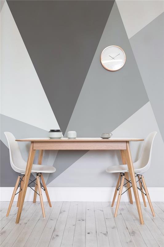 poslikava stenske trikotne ure dekoracija majhna jedilna miza svetel les beli stol parket svetlo siva laminatna tla