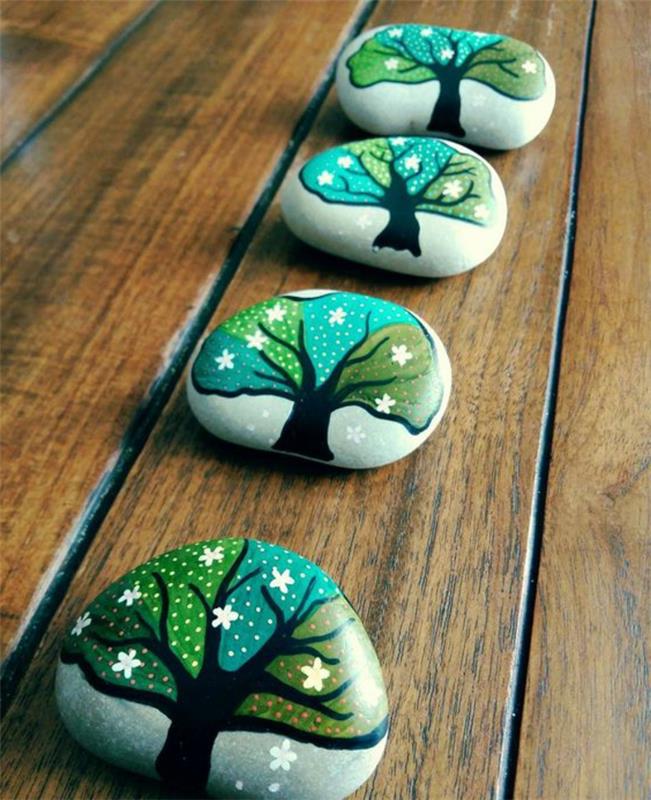 akmenukų tapyba, dekoratyviniai medžiai nupiešti ant akmenukų