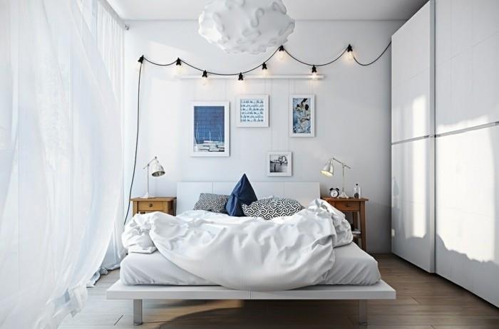 mažas miegamasis-skandinaviška atmosfera-sienų tapyba ir-patalynė-balta-sienų apdaila-skandinaviško dizaino pakabukas-lempa