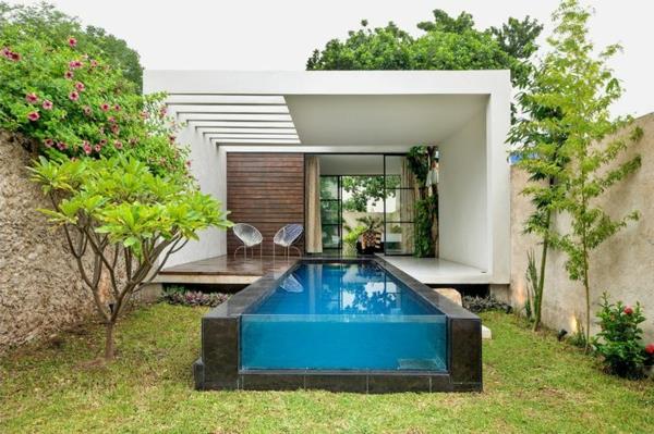mažas-virš žemės baseinas-šiuolaikinio namo dizainas