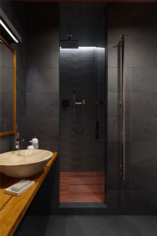 mažos erdvės vonios kambario išdėstymas su dušo kabina, medinė ir juoda vonios spintelė, madingos šiuolaikinės interjero spalvos