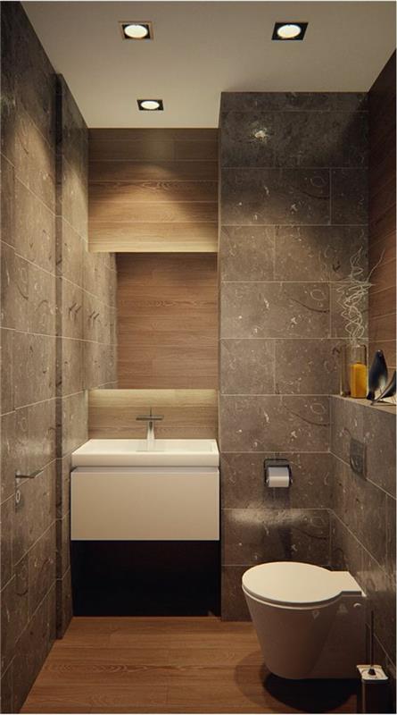 mažas vonios kambarys su granito tipo danga su didele šiuolaikiška kriaukle ir kūginiu tualeto spintele