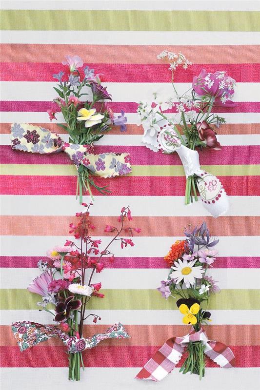küçük kır çiçekleri buketlerinin renkli bir kumaş düşüşüyle ​​süslenmesi, doğal ev dekorasyonu, kolay ve hızlı manuel aktivite