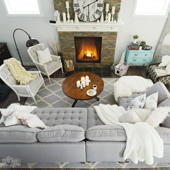 fotografija visoke deko dnevne sobe, ki kokodira skandinavski hygge norfdični slog, sivi kotni kavč