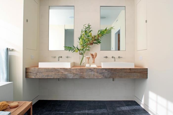 mehka in pomirjujoča dekoracija kopalnice v minimalističnem in naravnem slogu z umivalnikom iz naravnega lesa