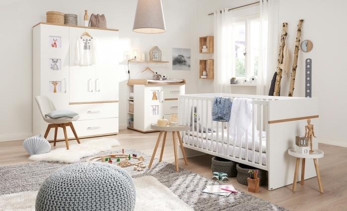 geniş yumuşak halı ve gri tığ osmanlı ile beyaz ve ahşap komple bebek odası modeli