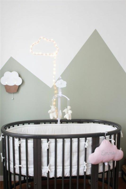 inci gri renk grimsi tonları yuvarlak bebek yatağı ile çocuk odası