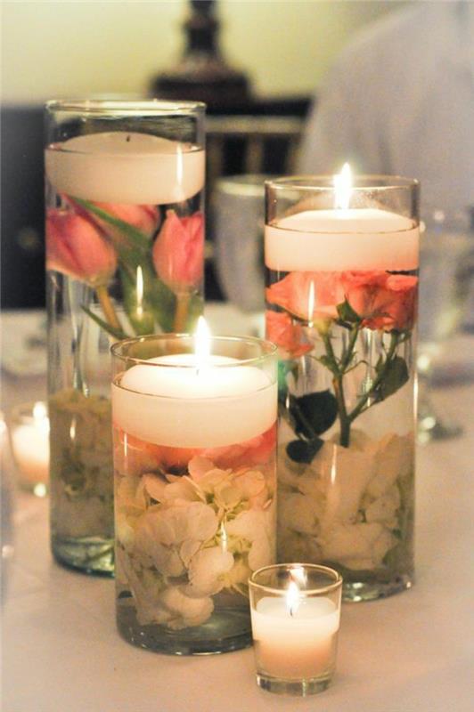 çeşitli şekillerde çiçeklerle süslenmiş jel mum modelleri, jel mum ve taç yaprakları ile dolu cam kap