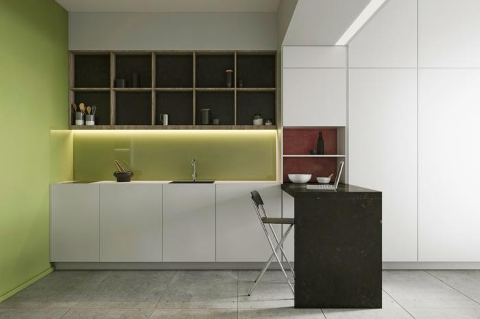 virtuvė perdažyta reseda žalia spalva, šviesiai pilka plytelių plokštė, baldai ir lubos - balti, lentynos šviesiai rudos spalvos