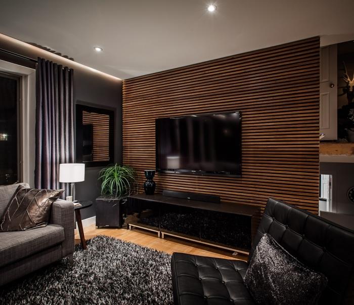 modernus kambarys su tamsiomis sienomis su baltomis lubomis, pakabintomis nuo ledinių dėmių, idėja medinė sienų apdaila su horizontaliomis juostomis