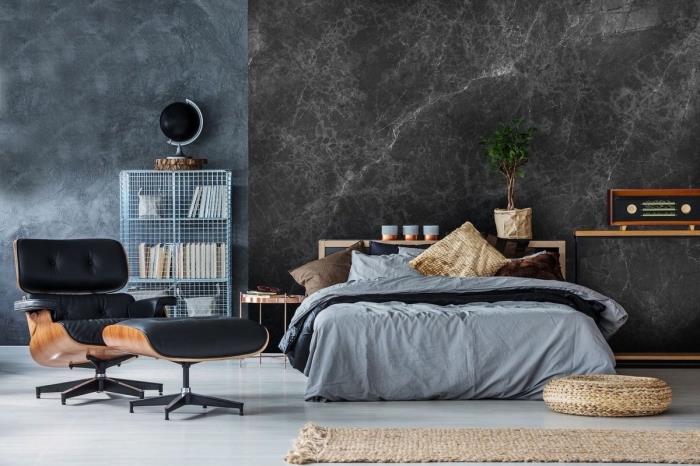 gri mermer efektli koyu duvarlar ve kahverengi ahşap mobilyalar ve siyah deri ile beyaz zemin ile yetişkin yatak odası dekoru