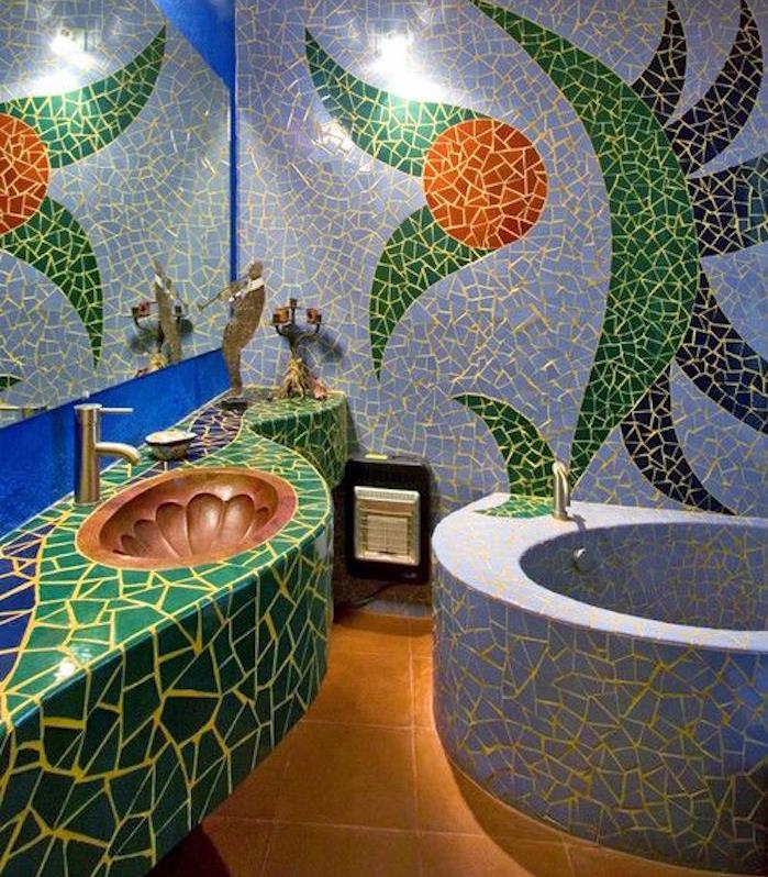 rivestimenti-bagno-mosaico-vasca-rotonda-lavabo-integrato-idea-decorazione-pareti-sanitari