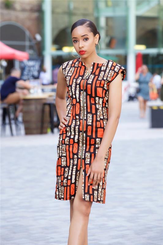sodobna afriška ženska moda z midi obleko v oranžni in črni barvi, obleka do kolen z režo