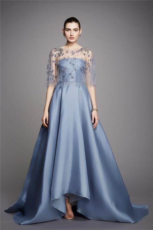 ilga vakarinė suknelė pastelinės mėlynos spalvos su metalo audinio apdaila ir skaidriu bolero su smulkiais sidabro siūlų siuvinėjimais ir 3/4 rankovėmis