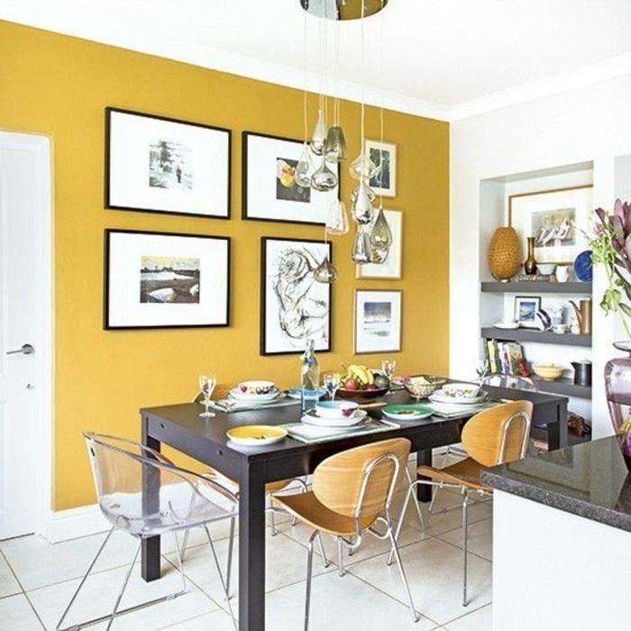 yemek odası-sarı-duvar-büyük-siyah-masa