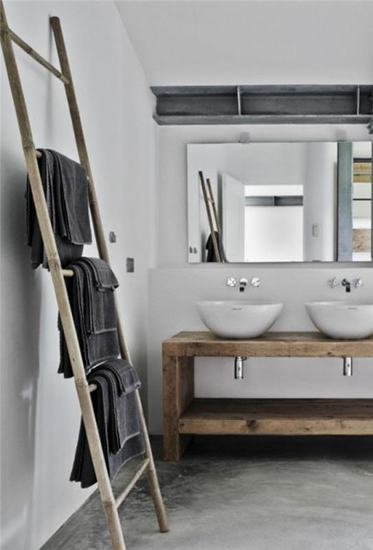 vonios kambarys su dekoratyvinėmis betoninėmis grindimis-pilkos spalvos interjeras prašmatniame ir moderniame vonios kambaryje