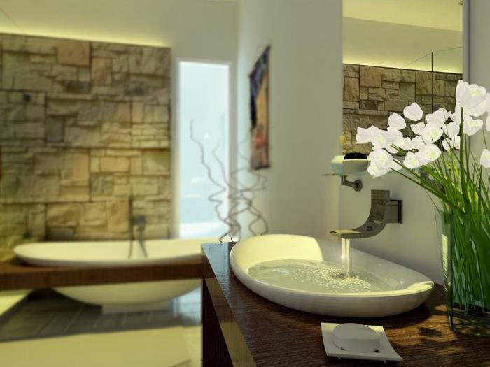 „Cocooning“ vonios kambarys, baltas stalviršio praustuvas, apdaila su orchidėja, natūralaus akmens apdaila, moderni vonia