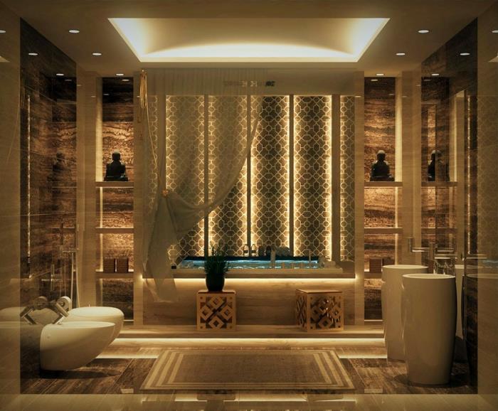 kokonuojantis vonios kambarys, japoniško stiliaus vonios kambarys, dvi Budos statulėlės, baltos kolonėlės kriauklės