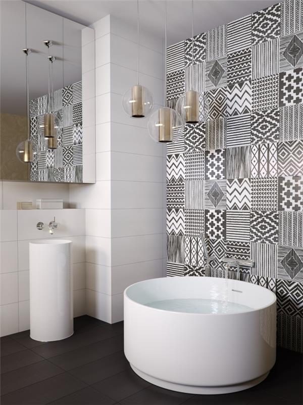 nedidelio vonios kambario su apvalia vonia išdėstymas, vienspalvės etninės kratinių cemento plytelės, ribojančios vonios erdvę