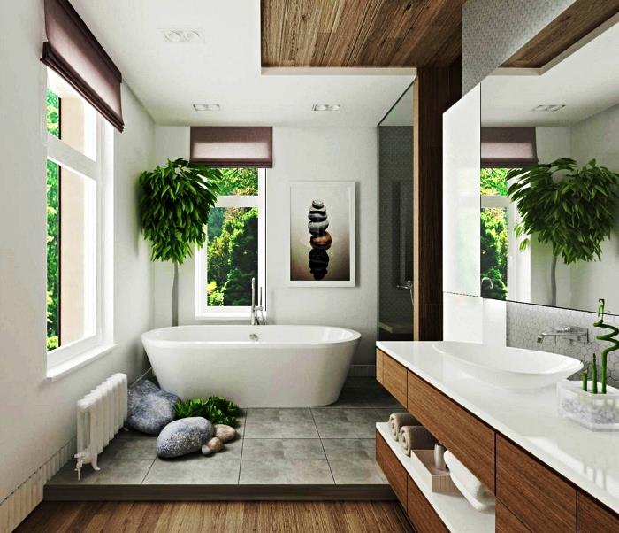 Zen in topla kopalnica v lesu in beli barvi po navdihu japonskega sloga s samostoječo kadjo na stopničkah, stenskim plakatom Zen in rastlino iz bambusa