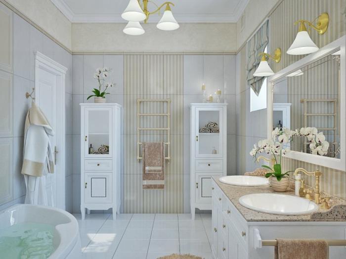 büyük beyaz banyo, beyaz lambalar, zarif lavabo, çekmeceli beyaz dolap, büyük çerçeveli ayna, saklama sütunları