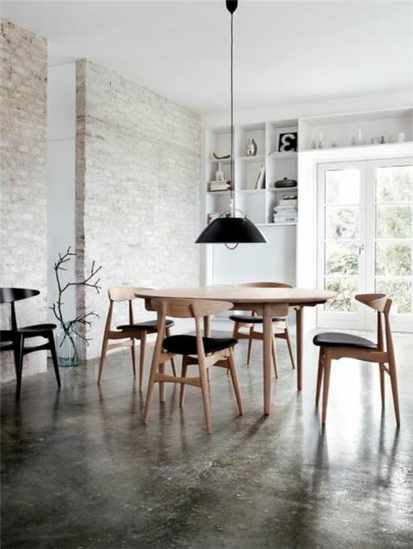 svetainė-su-dekoratyvinėmis-betoninėmis grindimis-sienos-modernus-interjeras-baldai-pigiai atitinkančios