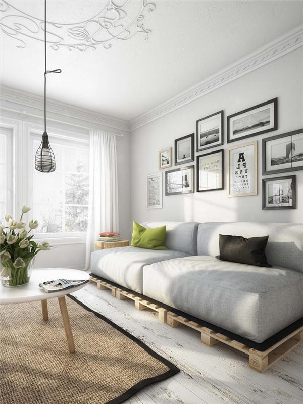palet kanepe ile temiz bir tasarım ile İskandinav tarzında gri ve beyaz modern oturma odası
