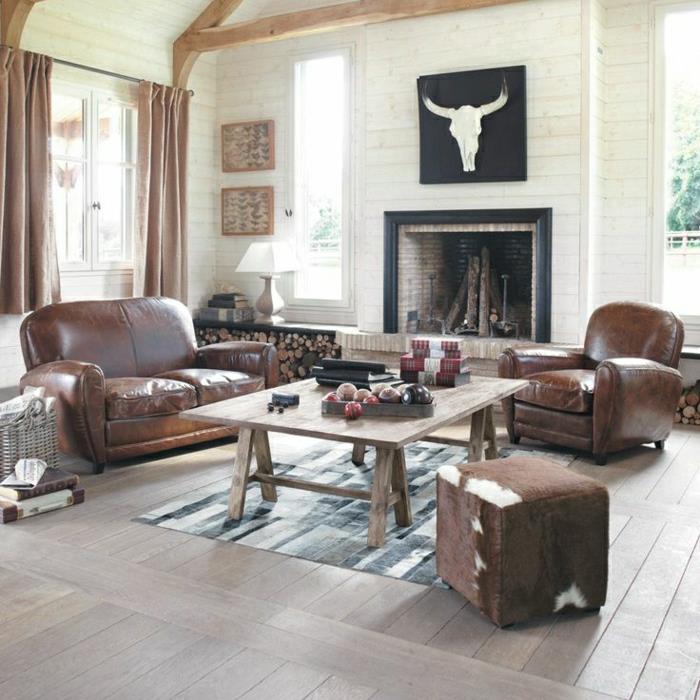 svetainė-ruda-oda-kilimas-parketas-grindys-dažai-židinys-smėlio spalvos-užuolaidos