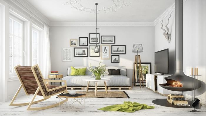 palet kanepe ile temiz bir tasarım ile İskandinav tarzında gri ve beyaz modern oturma odası