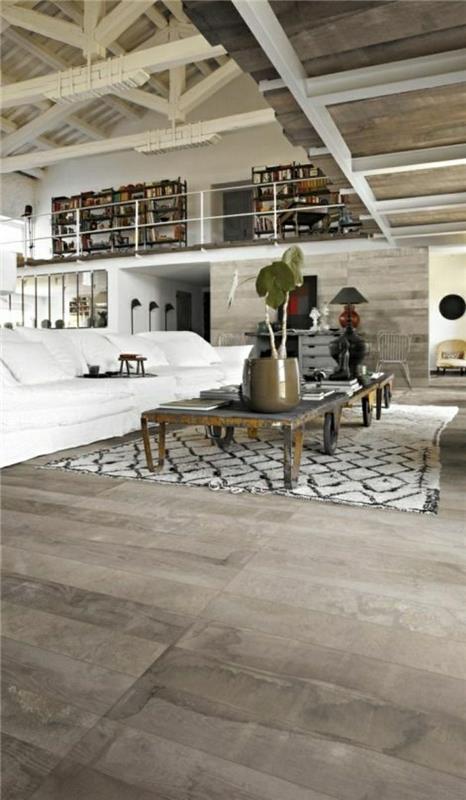 taupe-lounge-cocooning-vzdušje-bela-kavč-bež-preproga-lesena-miza-zelena-rastlina