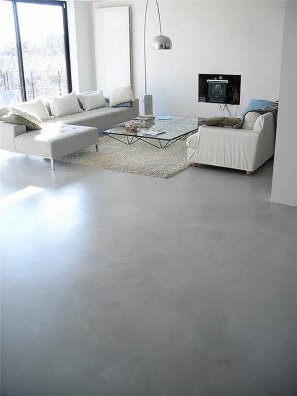 smėlio spalvos grindys-taupe-smėlio spalvos-prašmatnūs baldai-betone-dekoratyvinė-oda-ant-svetainės-grindų