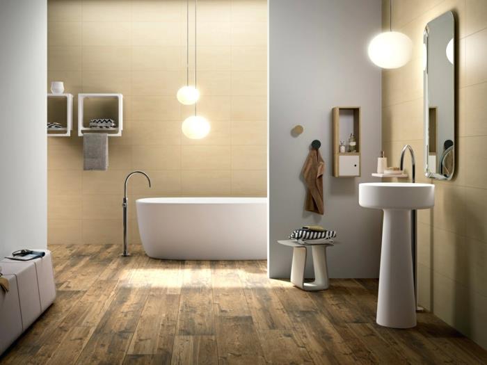 açık renklerde banyo, traverten taş karolar, ayaklı lavabo