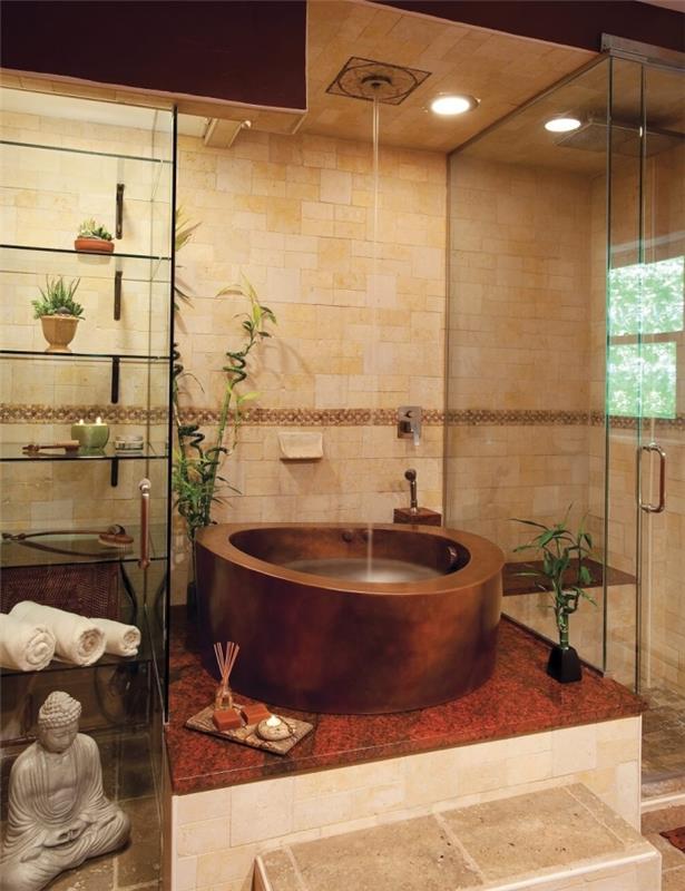 idėja, kaip papuošti zen vonios kambarį su vonia ir dušu, azijietiško stiliaus dekoratyvinius aksesuarus su statulėle ir žvake