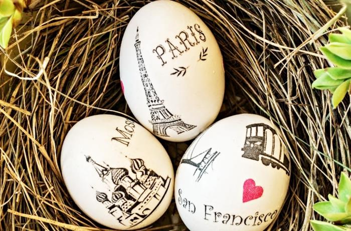 papuošti Velykų kiaušinius turizmo objektų piešiniu ir miestų pavadinimais, Velykų krepšelį su baltais kiaušiniais