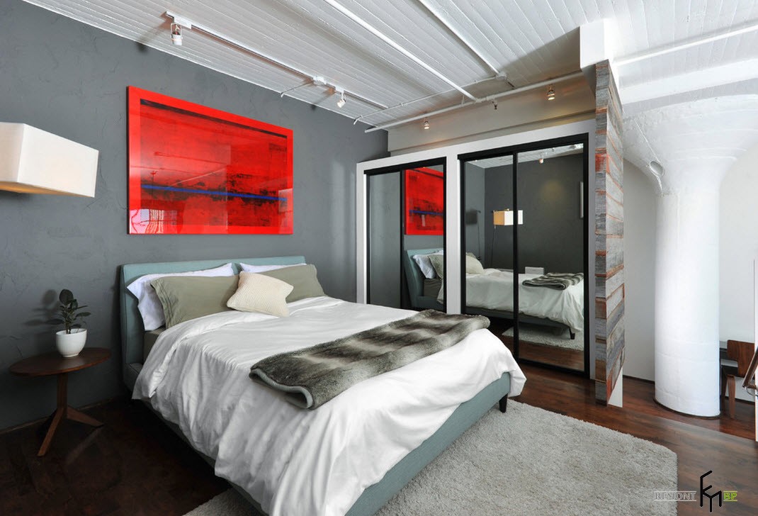 Punto luminoso in una camera da letto in stile loft