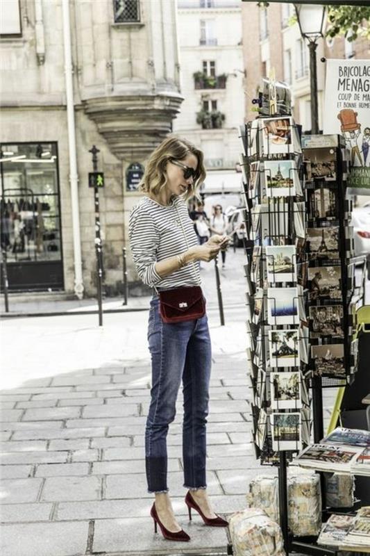 street-style-francese-ragazza-jeans-vintage-maglietta-basic-scarpe-rosse-tacco-alto-borsetta-abbinata