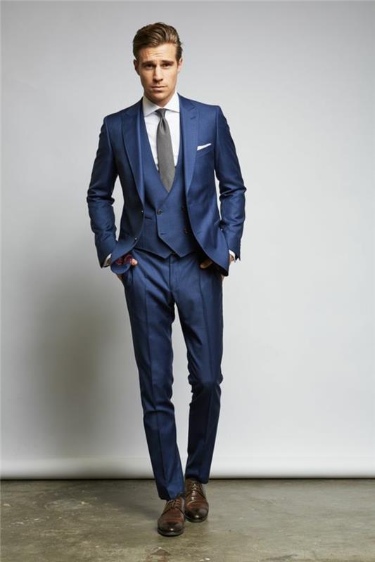 açık kahverengi ayakkabı, mavi takım elbise, beyaz gömlek, beyaz mendil, gri kravat, koyu mavi yelek, 3 parça erkek takım elbise