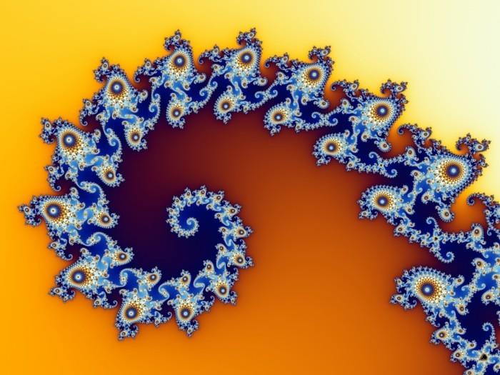Fibonačio seka-algoritminė spiralė geltonai oranžinės ir mėlynos spalvos